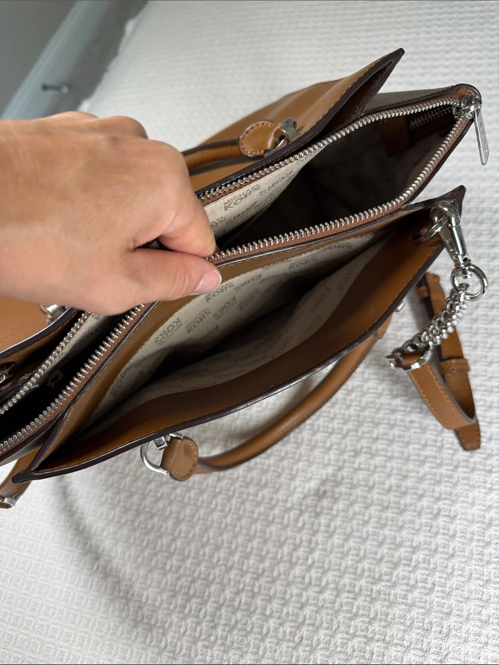 Michael Kors saddle tan saffiano leather satchel with silver hardware